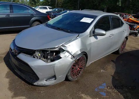 2017 Toyota Corolla Le z USA, uszkodzony, nr VIN 2T1BURHE8HC935821